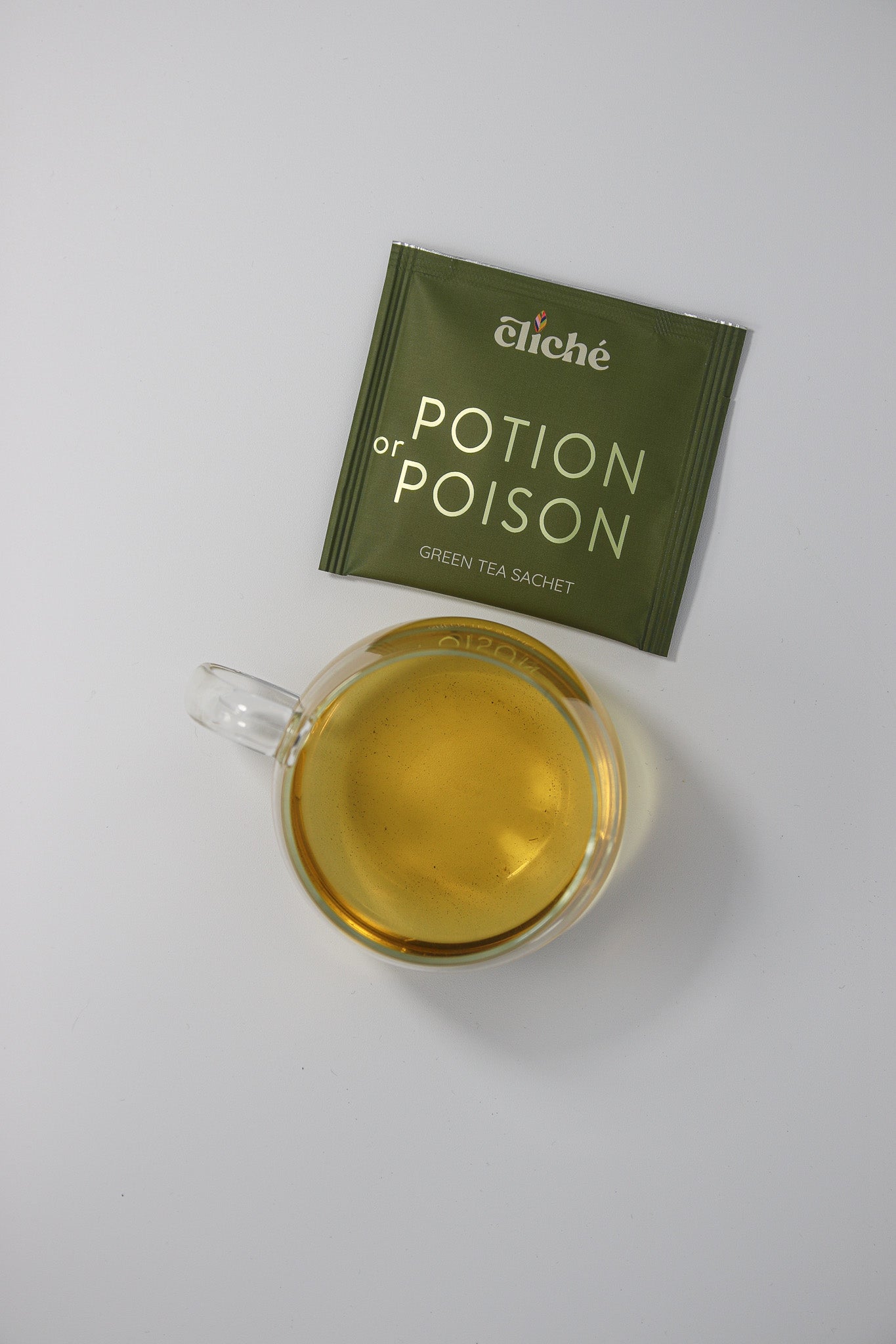 The front and back of the packaging for Potion or Poison, an herbal tea sachet.